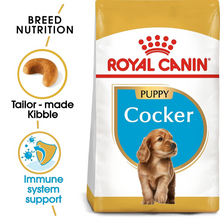 Product marketing image showing a bag of Royal Canin Cocker Puppy food alongside a puppy photo and highlights for tailor-made kibble.