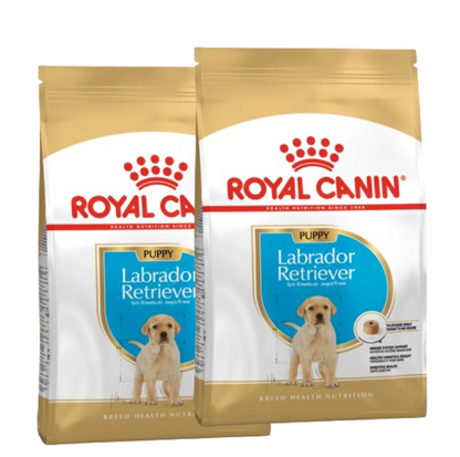 Two bags of Royal Canin Labrador Retriever Puppy dry dog food for puppies up to 15 months old.